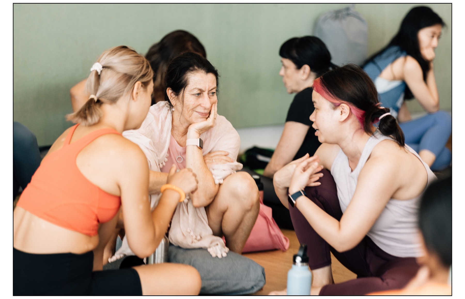 Trainees sitting together in a group discussion session